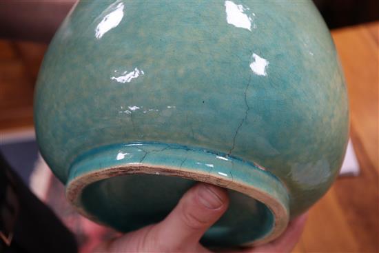 A large Chinese turquoise crackle-glazed bottle vase, incised Kangxi mark but later height 43cm